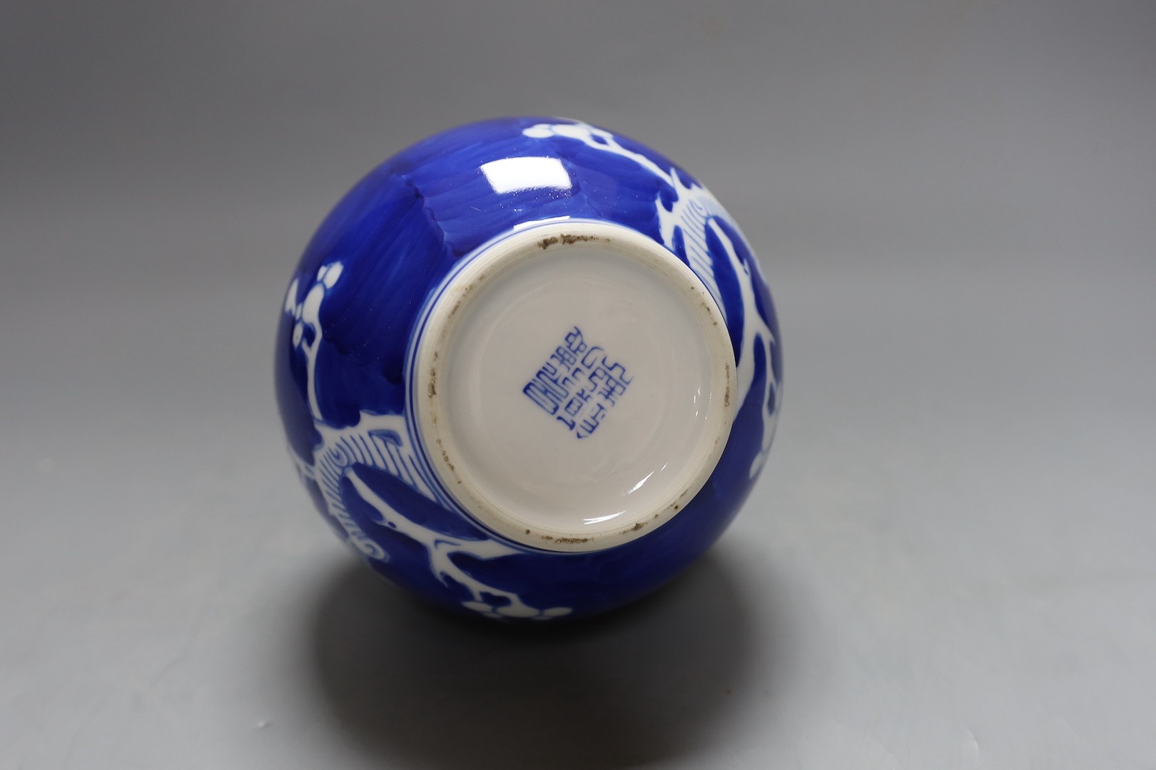 A Chinese blue and white vase, 23 cm high a similar box and two porcelain bowls